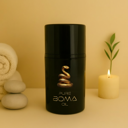 Zwarte fles Pure Boma Oil met een gouden slangmotief