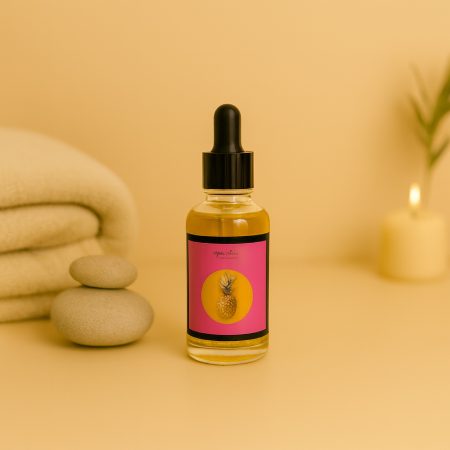 Glazen flesje Pumpum Oil met pipetdop en roze etiket